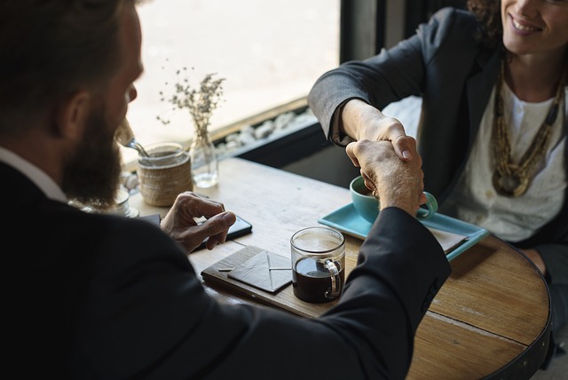 client trust and loyalty shaking hands